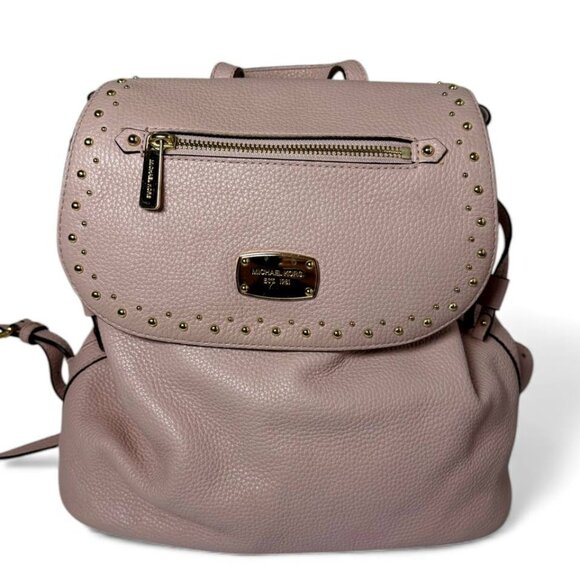 Michael Kors Riley small pebbled leather flap backpack in a light pink color - Picture 1 of 8